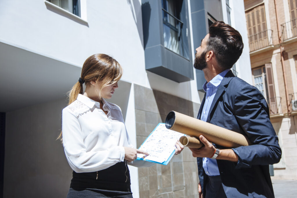 Property consultants inspecting Dubai property for international investors